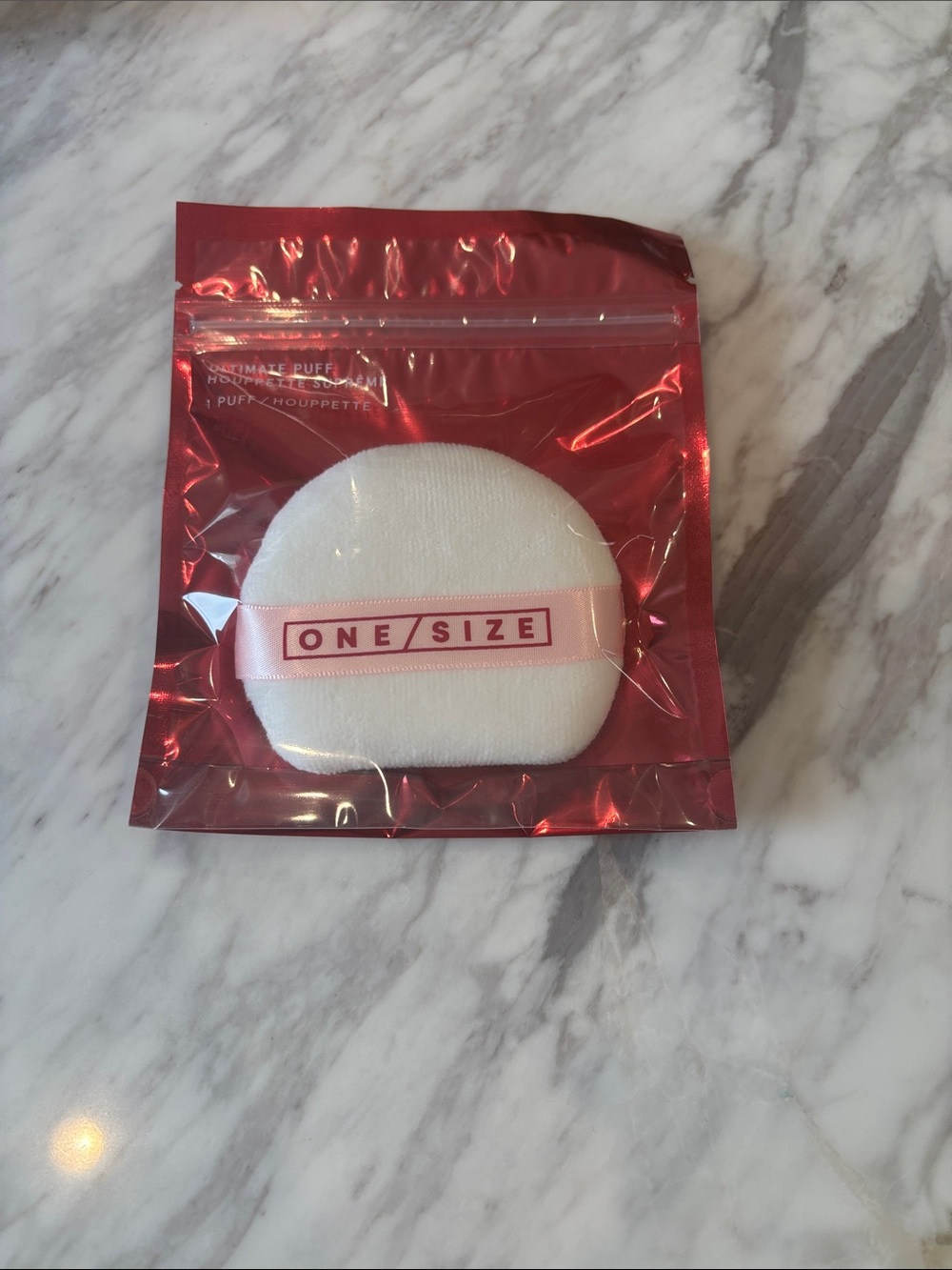 ONE/SIZE Metallic Red Packaging with White Powder Puff